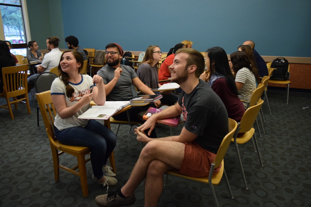 Students prepare for the activity by reading the questions projected on the screen